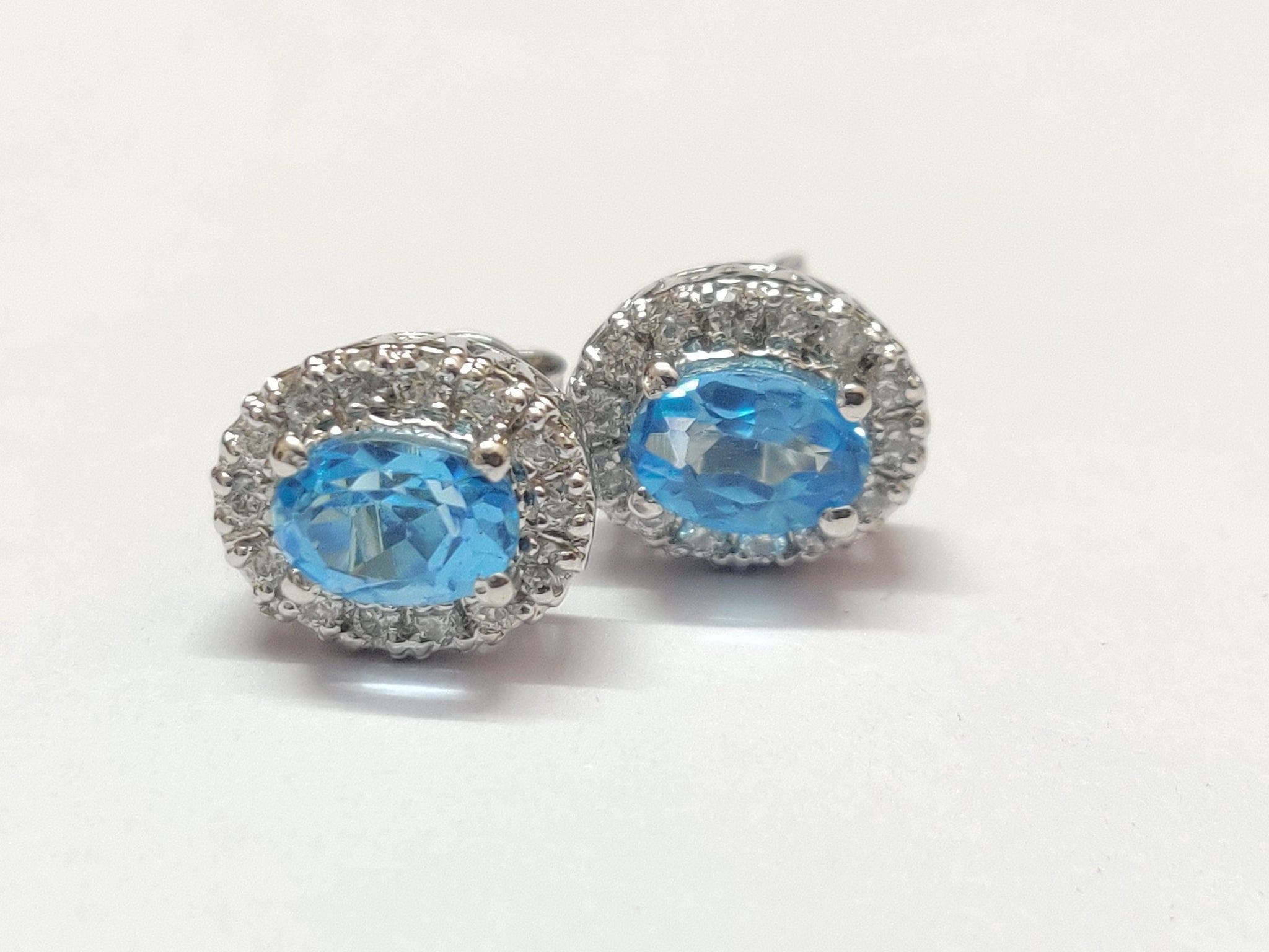 Swiss Blue Topaz Ear Studs 2 Ct Swiss Topaz Stud Earrings Blue Topaz Earrings 5x7 mm oval Swiss Blue Topaz Cluster Earrings Birthstone Studs